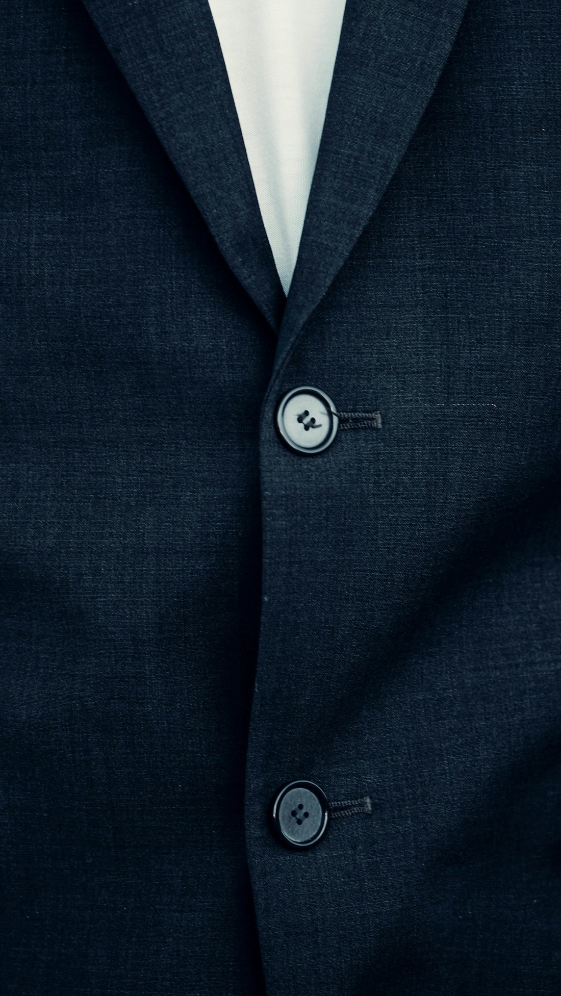a person wearing a suit and tie