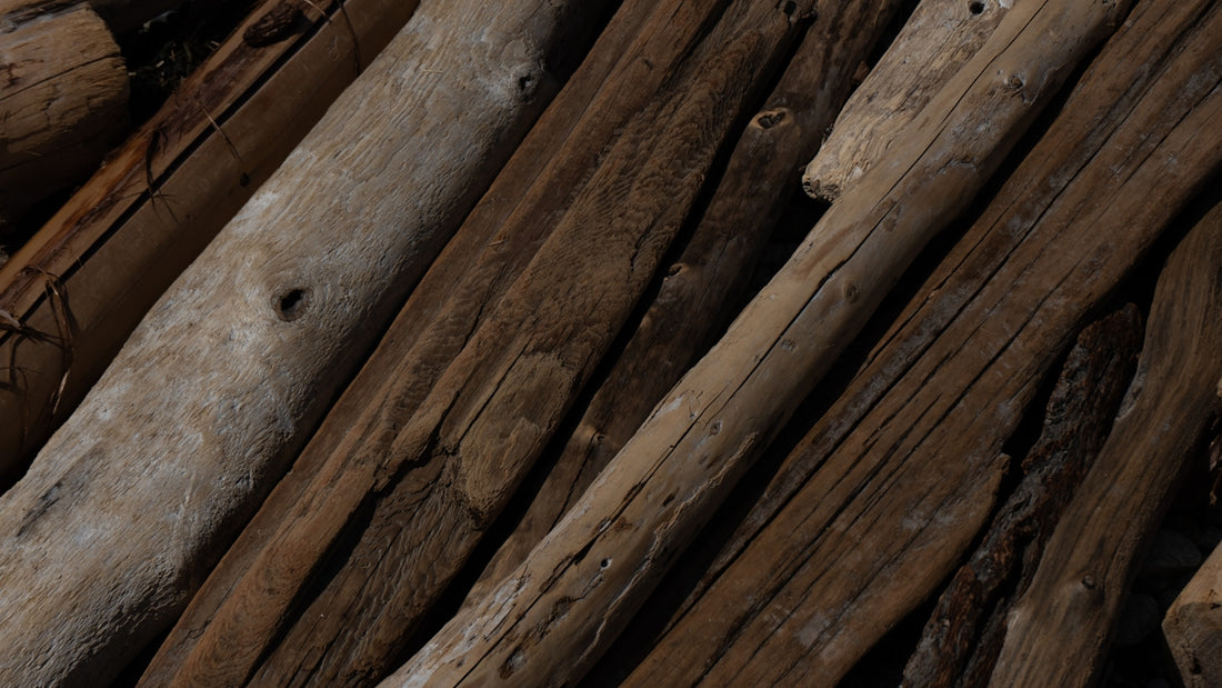 a close up of a bunch of wood logs